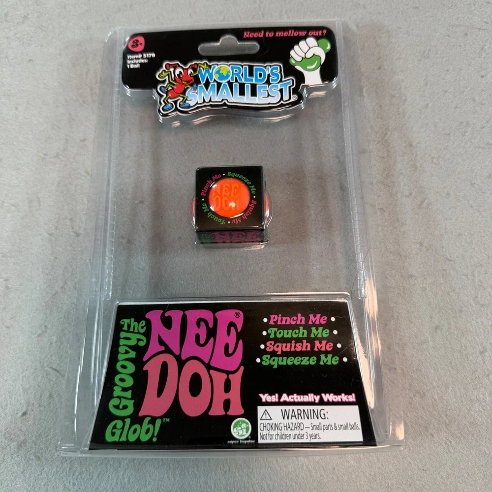 World's Smallest NeeDoh Groovy Glob Orange Mini Squishy Toy 5179
